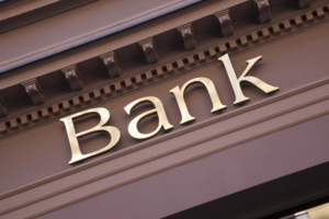 bank sign on building growing a savings account