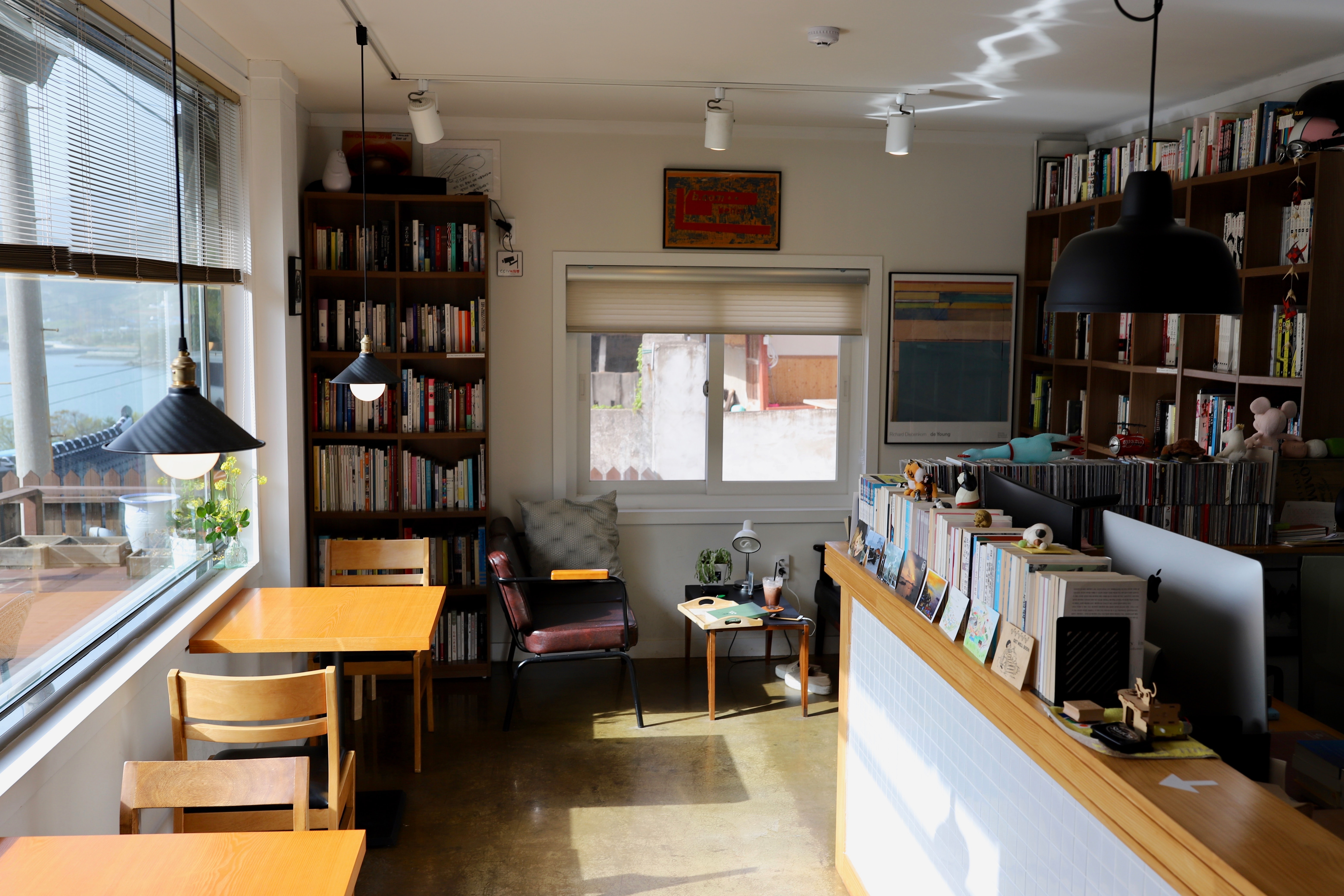 small home library with books on shelves everywhere